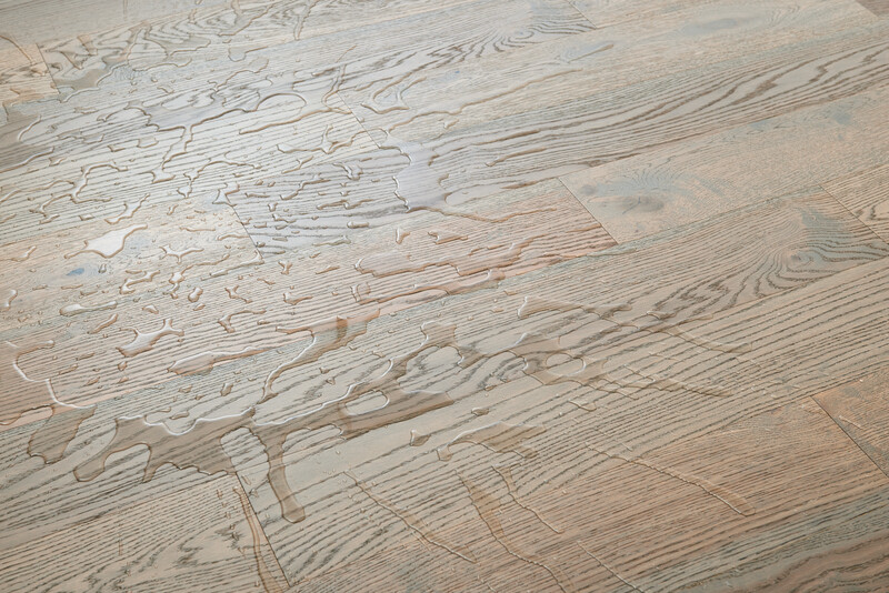 Closeup of HydroBlok engineered hardwood beading water