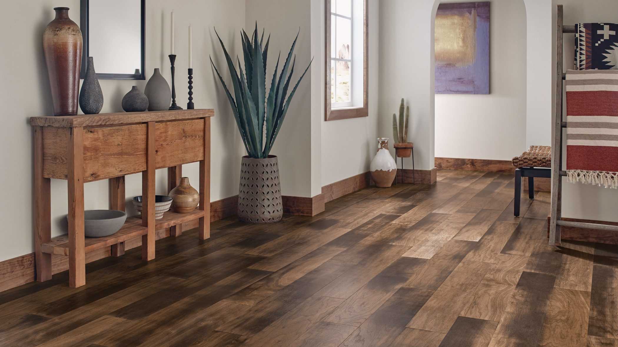 Southwestern motif in an entryway with beautiful hardwood floors